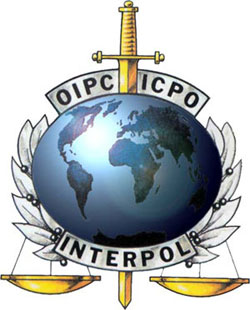 Interpol logo - The Logic of Nazification (Re FBI, Third Reich &amp; the Birth of Interpol)