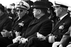  South Korean Prime Minister Chung Il Kwon is flanked by his hosts, Rear Adm. George S. Morrison, left, commander of Carrier Division Nine, and Vice Adm. William F. Bringle, commander of the U.S. 7th Fleet in the Pacific, as they watch jets from Air Wing 21 take off and land on the deck of the carrier USS Hancock.