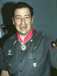 Former Salvadoran Minister of Defense Eugenio Vides Casanova is shown after receiving a medal, in a photo dated Dec. 12, 1988.