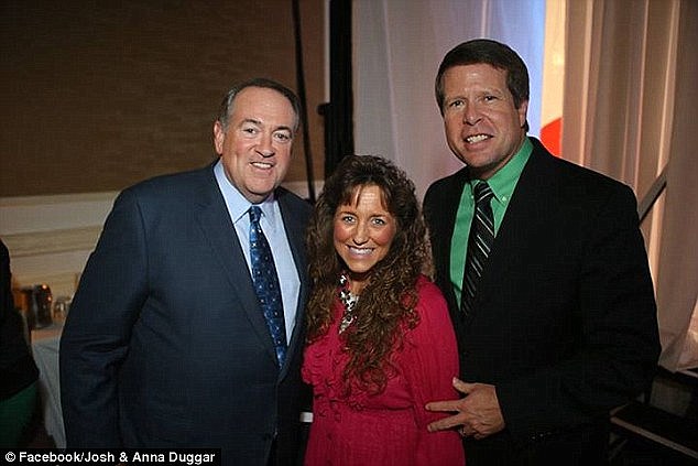 Two molester links and counting: Mike Huckabee with Jim Bob and Michelle Duggar, who had been high-profile supporters of his campaign until their son's incestuous abuse was revealed